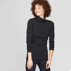 Black a new day turtle neck sweater